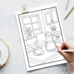 Relaxation coloring page on a marble surface showing a cozy kitchen or dining nook with a steaming cup of tea, a teapot, plants, and large windows.