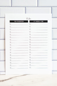 Minimalist two-column to-do list printable page with checkbox circles.