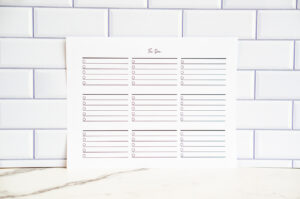 Simple to-do list printable with multiple lined sections for writing tasks, displayed on a subway-tile background.