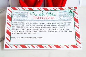 Close-up of a &ldquo;Sorry I&rsquo;m Late&rdquo; North Pole telegram printable showing the typewritten message explaining why the elves are delayed.
