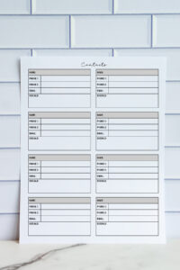 Printable contact list page with six boxed sections including name, phone numbers, email, and socials, shown against a white tile backdrop.