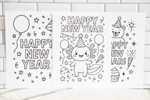 Three &ldquo;Happy New Year&rdquo; coloring pages displayed side by side against a white subway-tile backdrop, featuring designs with balloons, an axolotl, a bear, stars, and festive decorations.