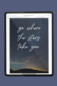 iPad showing a full-page inspirational digital planner cover featuring a starry night sky and the motivational quote &ldquo;go where the stars take you&rdquo; in white script lettering.