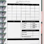 Monthly period tracker page inside a disc-bound planner featuring a blank monthly grid, symptom key area, period status checkboxes, and period stats table, displayed on a blush pink background.