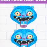A vertical graphic with a purple header that reads &ldquo;KPOP DEMON HUNTERS INSPIRED.&rdquo; Two Derpy Valentine cards are stacked vertically on a white subway tile background. The top Derpy holds a &ldquo;Happy Valentine&rsquo;s Day&rdquo; card, and the bottom Derpy holds a &ldquo;Hello Friend&rdquo; card, clearly showing both message options.