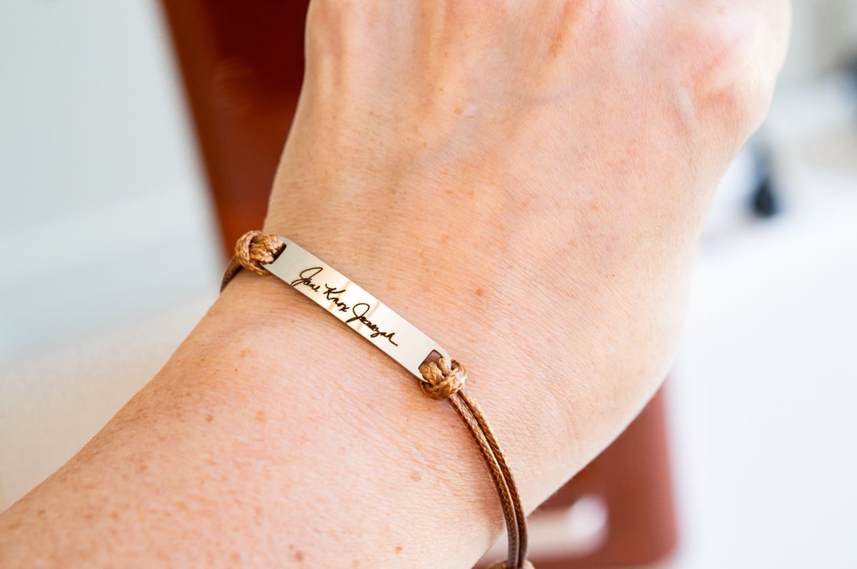 Custom bracelet engraved with a handwritten signature using the xTool F2 laser engraver
